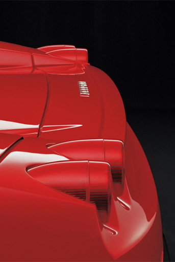 Ferrari Enzo 的 V12 引擎舱特写，碳纤维覆盖件和中央进气系统，展示引擎的纵向布局