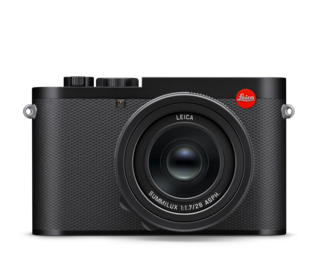 Leica Q3 相机正面视图，代表相机业务的核心产品